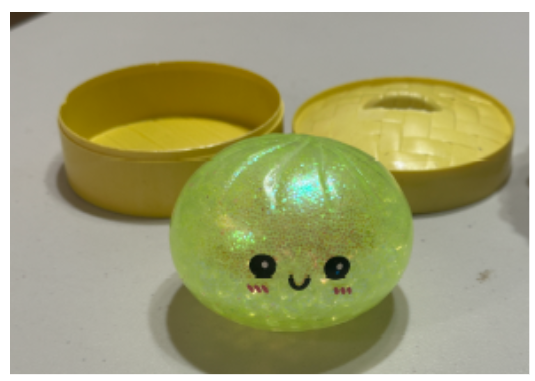 Regulator photograph of a squishy bun toy containing water beads, used by CPSC to illustrate its squishy-toy consumer alert.