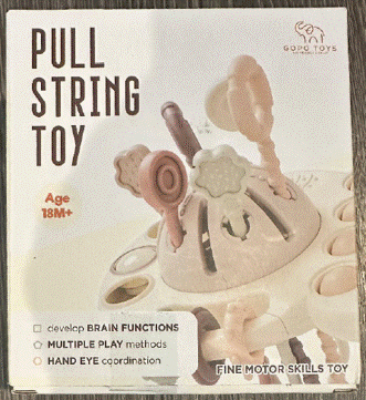 “GOPO TOYS” and “Pull String Toy” are printed on the front of the recalled teething toy packaging